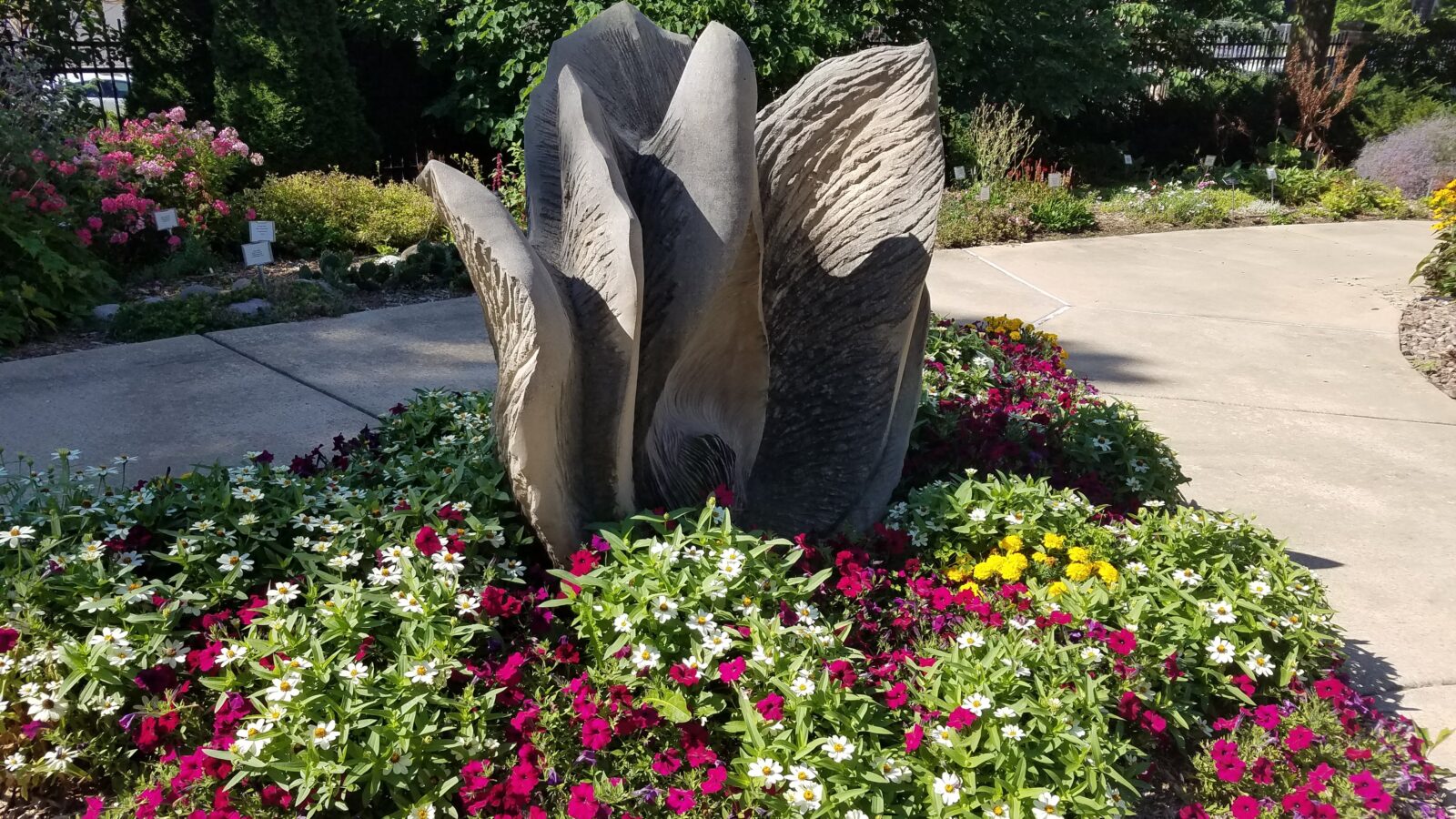 statue with flowers